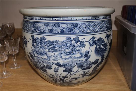 A Chinese blue and white jardiniere, diameter 37cms (star cracked)